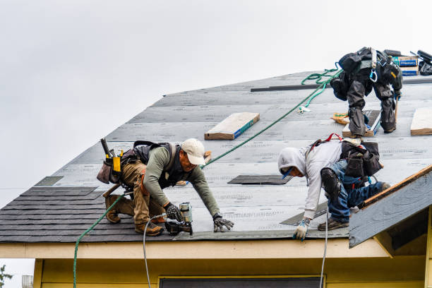Professional Roof Replacement technician working in Santa Fe Springs, CA